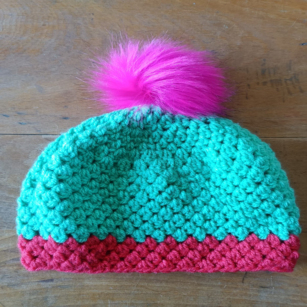 Two colour hat with pom pom